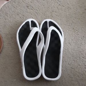 Pool size white flip flops